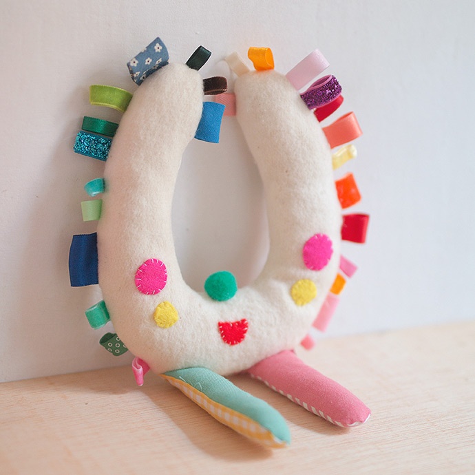 Handmade taggie doll: Handmade baby gift ideas | DIY at Handmade Charlotte