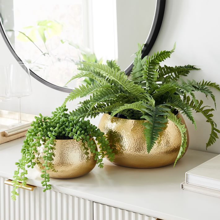 Stylish indoor planters to zhuzh up your living areas: Hammered metal planters at West Elm