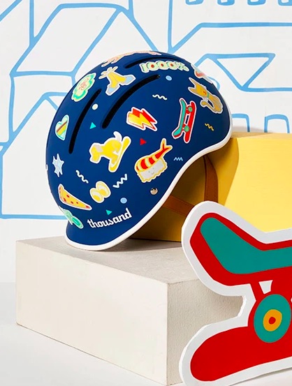 Teaching bike safety to kids by getting them to wear a bike helmet like the new ones by Thousand, coming in May 2021