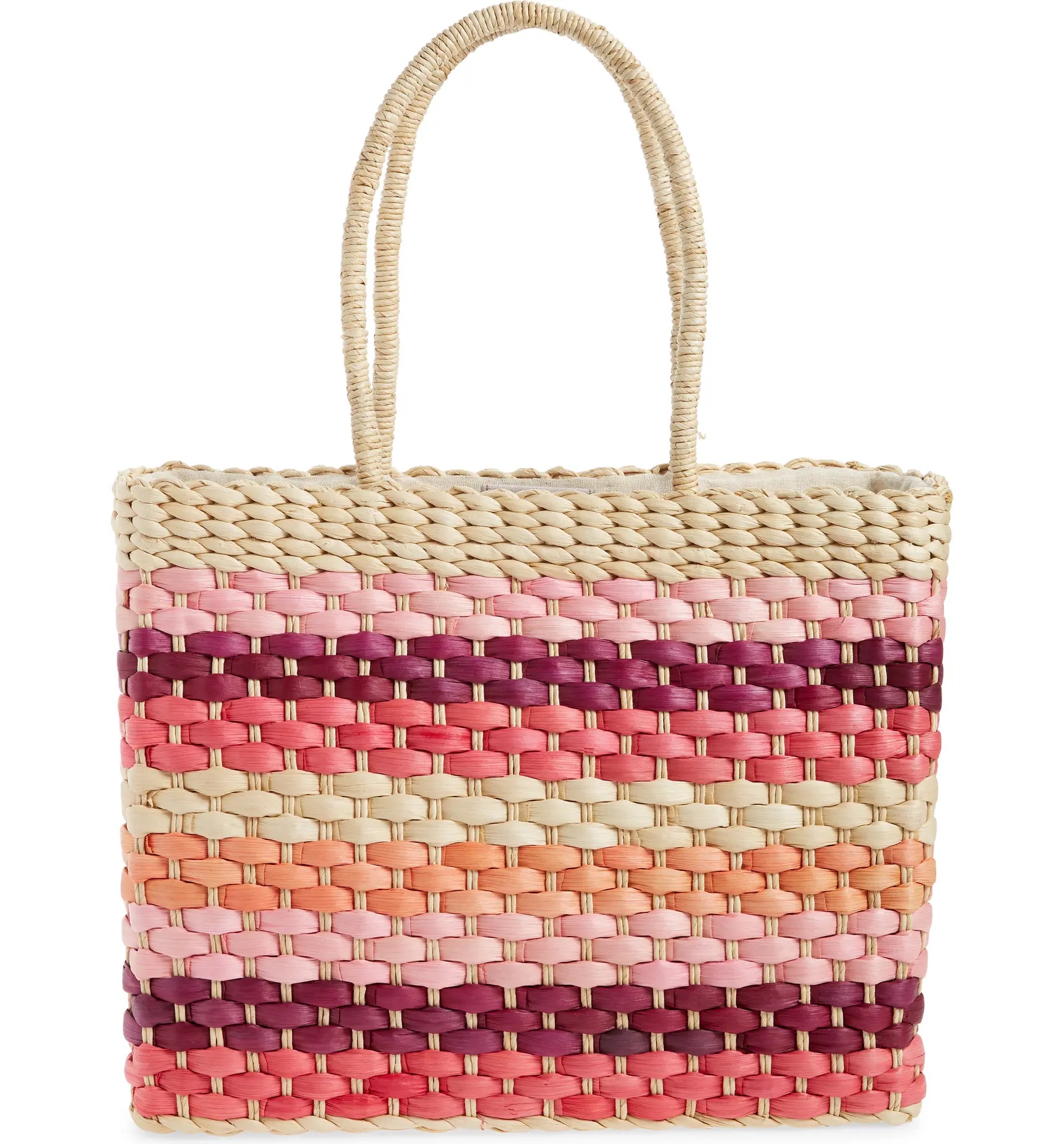 Fashionable beach totes for summer: This woven bag from btb Los Angeles goes from the beach to the bar seamlessly.