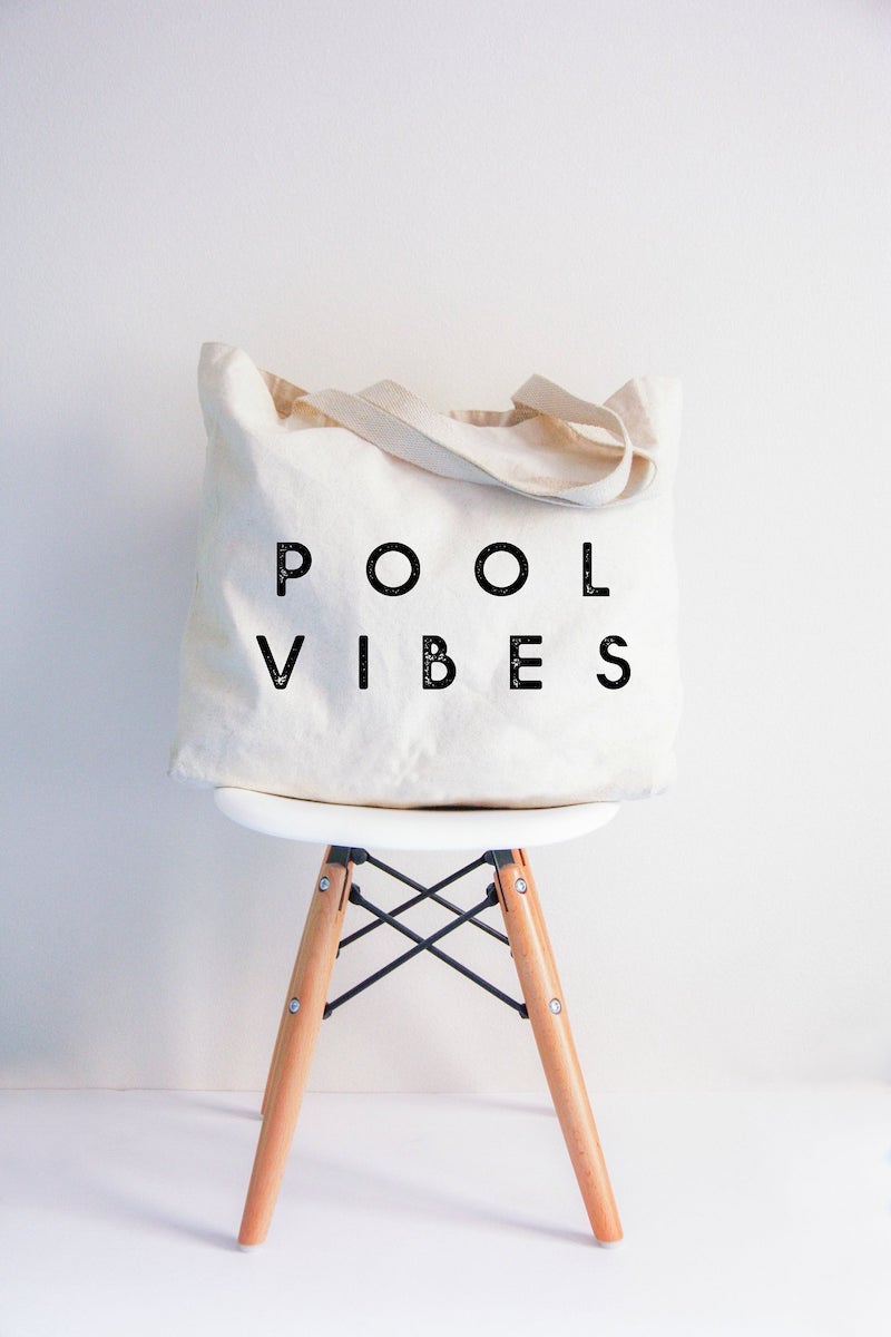 Fashionable beach totes for summer: Pool Vibes canvas bag is understated and simple.