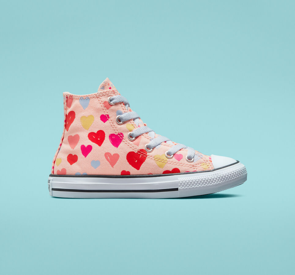 Converse makes so many cool Chuck Taylors for kids like this heart print | The Coolest Birthday Gifts for 8 year olds