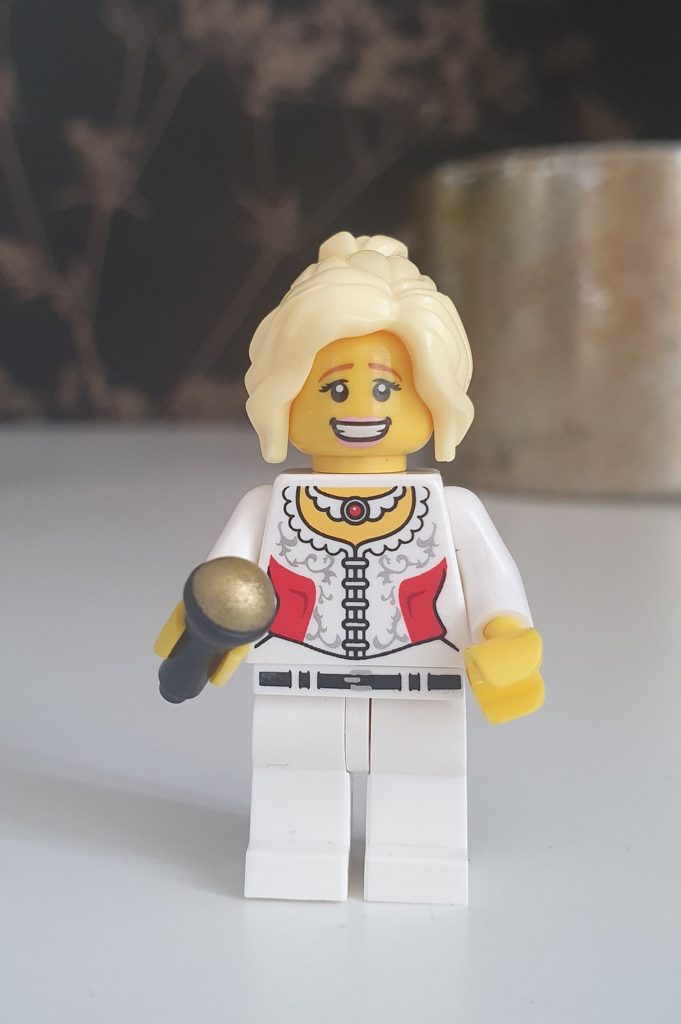 Gifts for Dolly Parton fans: Dolly minifig or keychain made by Sweeney Brick