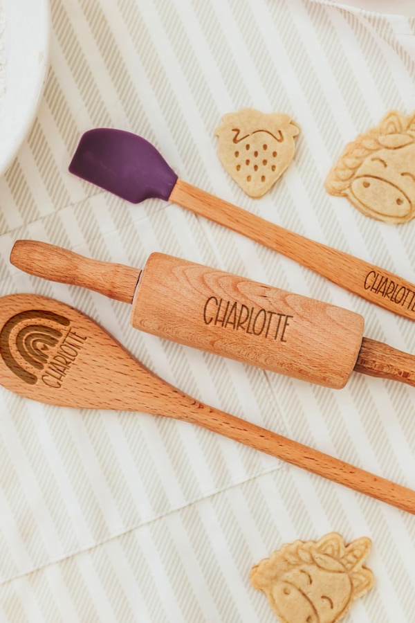 Personalized gifts for kids: This kid-sized personalized wooden baking set from A Few Spare Moments