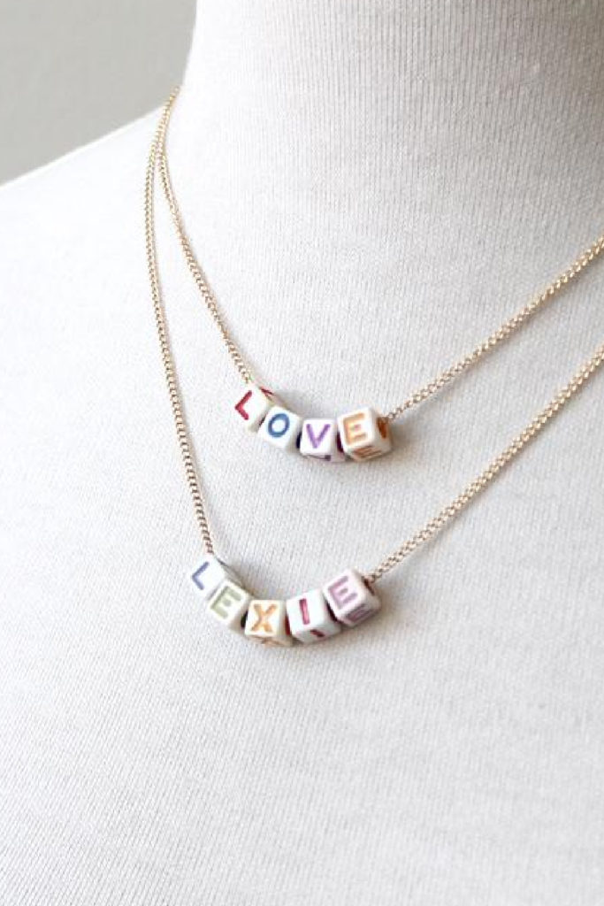 Cool personalized gifts for kids: This alphabet name necklace from artist Peggy Li is a great gift for tweens and teens