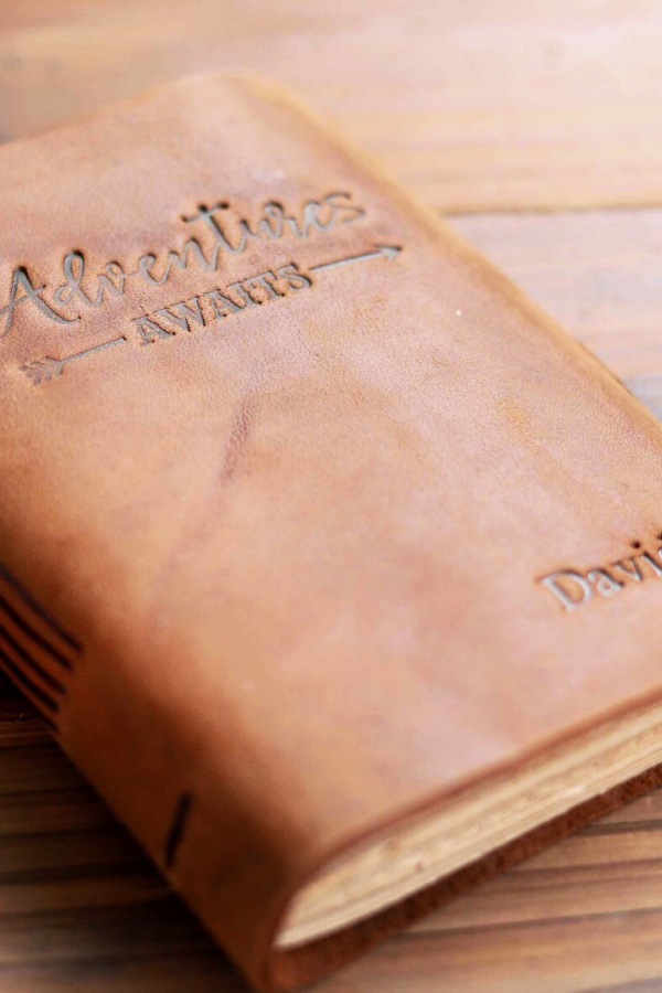 Personalized leather bound travel journal: Gifts under $15