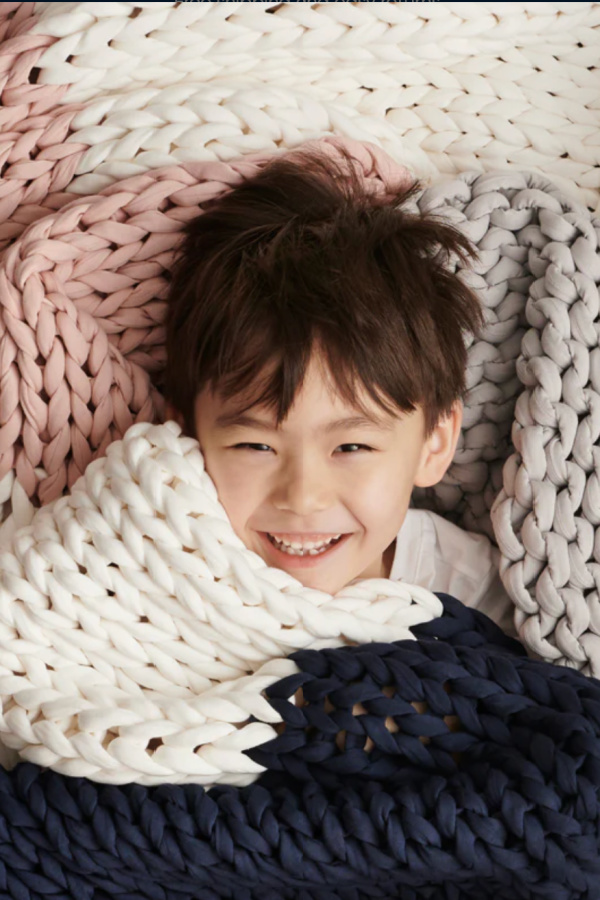 Valentine's gifts for boys: The organic cotton Nappling weighted blanket for kids from Bearaby