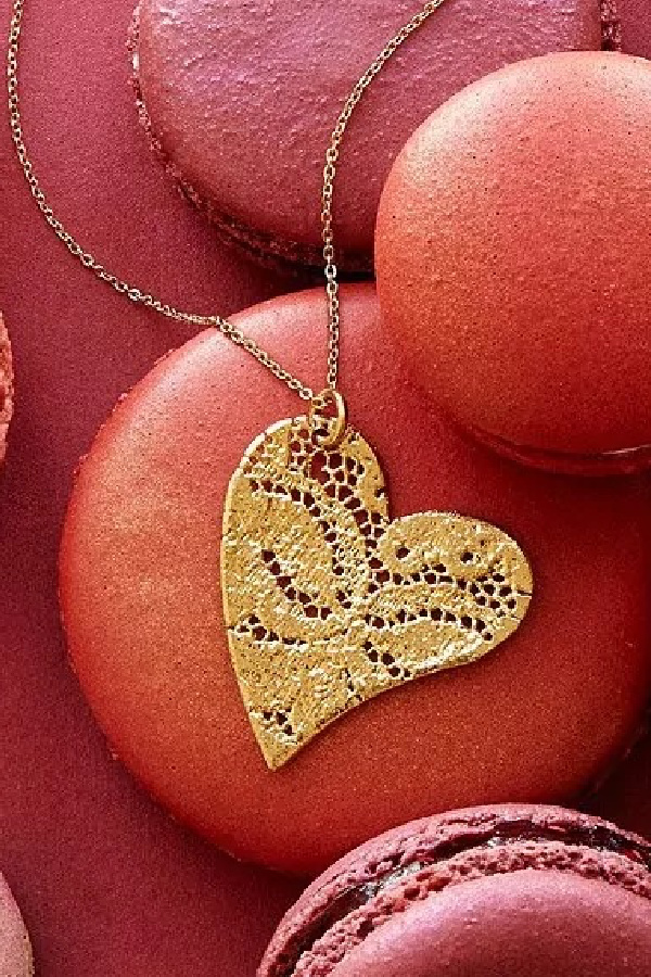 Valentine's jewelry for women who like edgier stuff: Gold dipped lace heart pendant from Gilded Lace