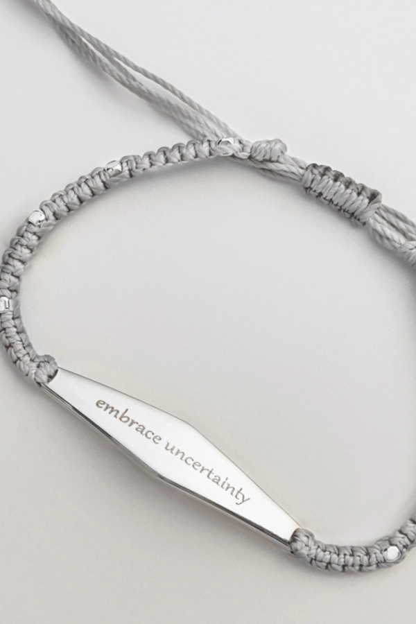 "Embrace uncertainty" - engraved on a bracelet from Presently Jewelry, which is actively addressing anxiety and mental health issues