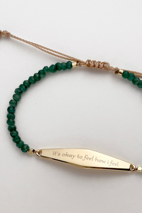 "It's okay to feel how I feel" - engraved on a bracelet from Presently Jewelry, which is actively addressing anxiety and mental health issues