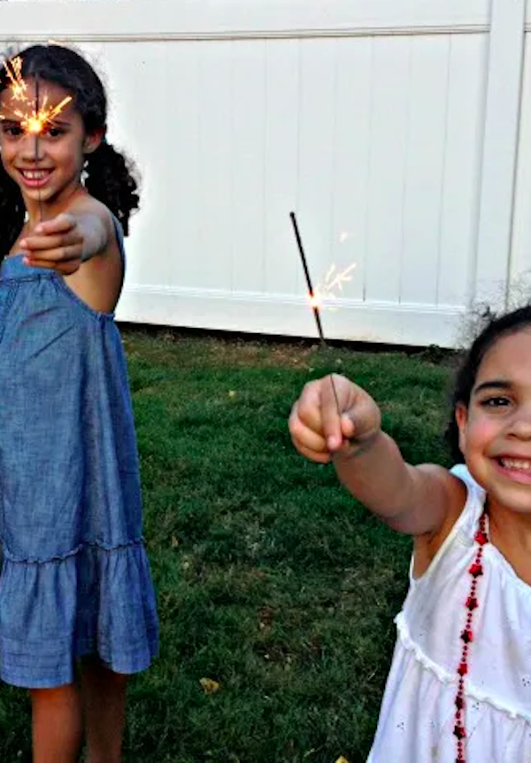 Sparklers are a fun way for kids to celebrate Fourth of July