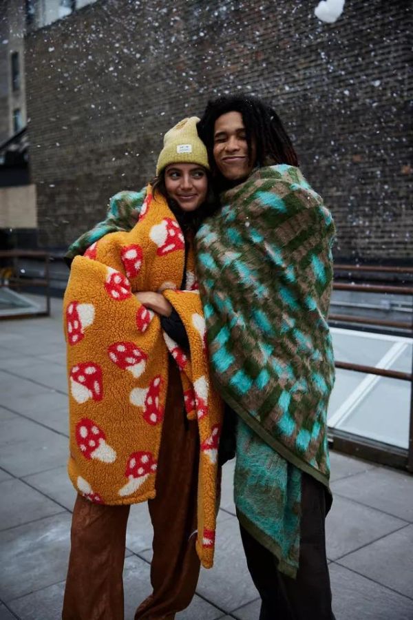 Oversized sherpa blanket from Urban Outfitters make a great gift for college students