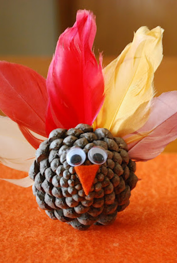 Cute pinecone turkey craft for kids from A Pumpkin and A Princess