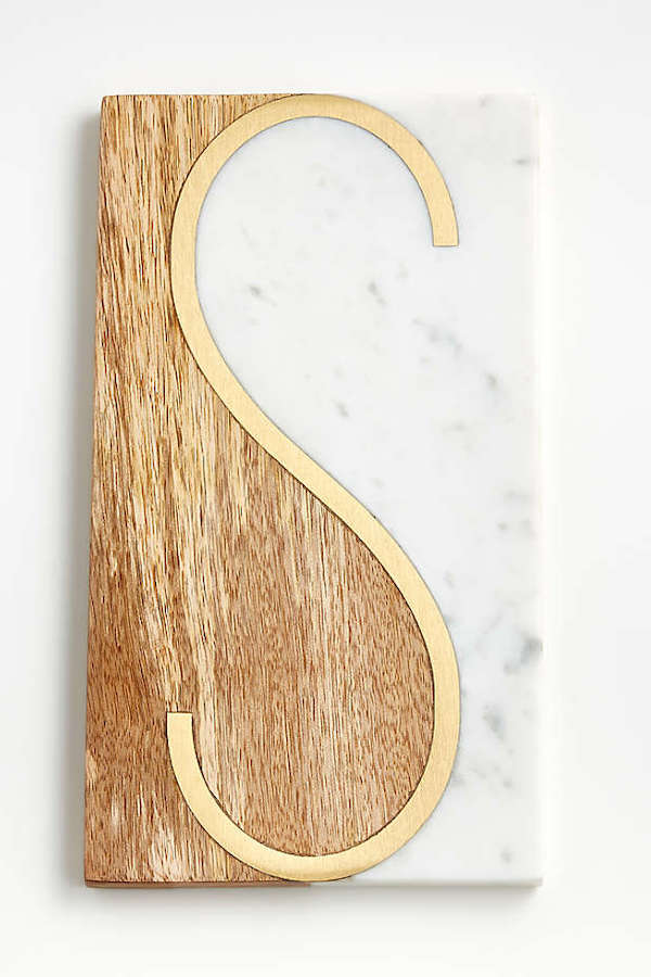 Crate and Barrel monogrammed cutting boards make an elegant personalized gift.