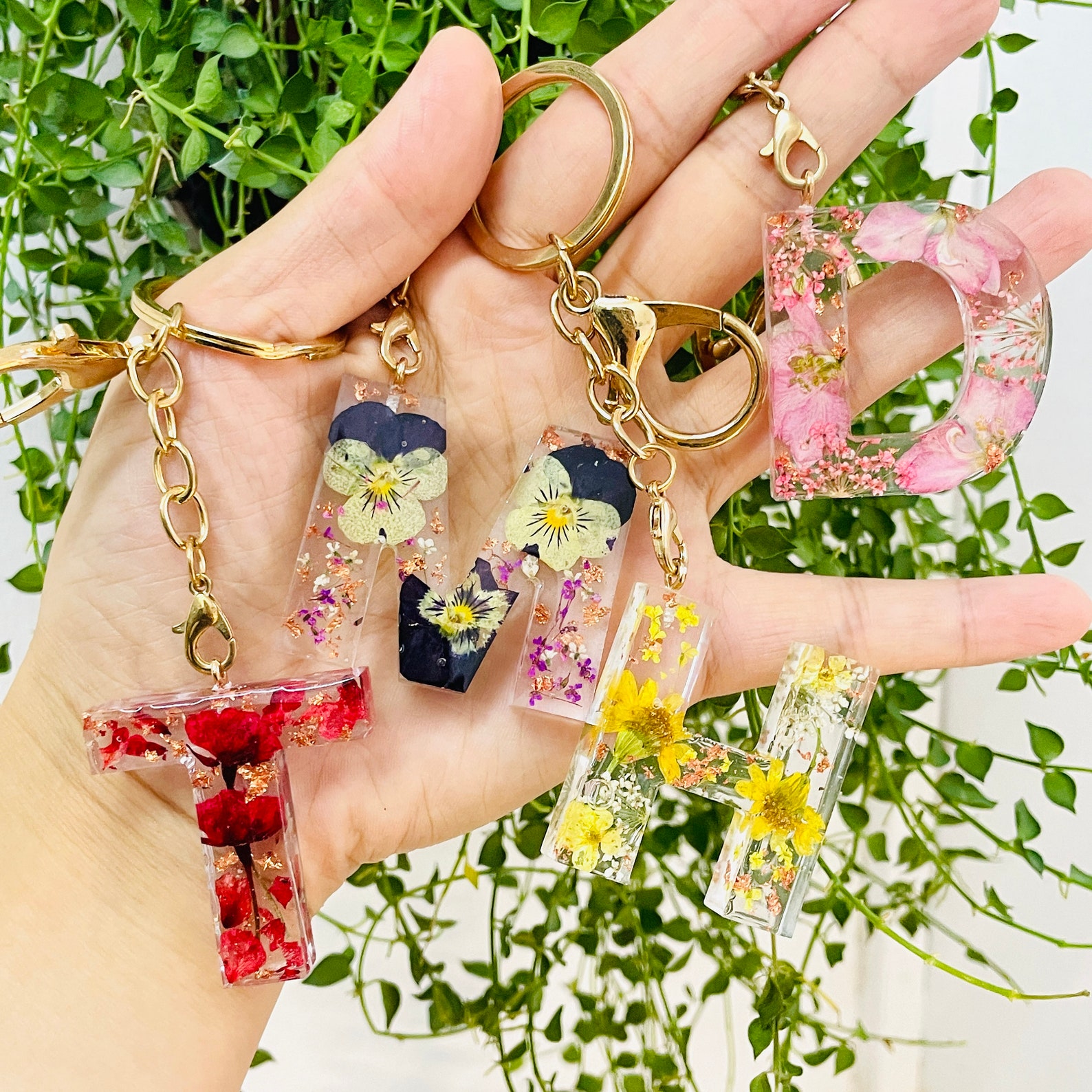 Best gifts under $15: Custom initial key ring with your birth month flower Best gifts under $15: Custom initial key ring with your birth month flower