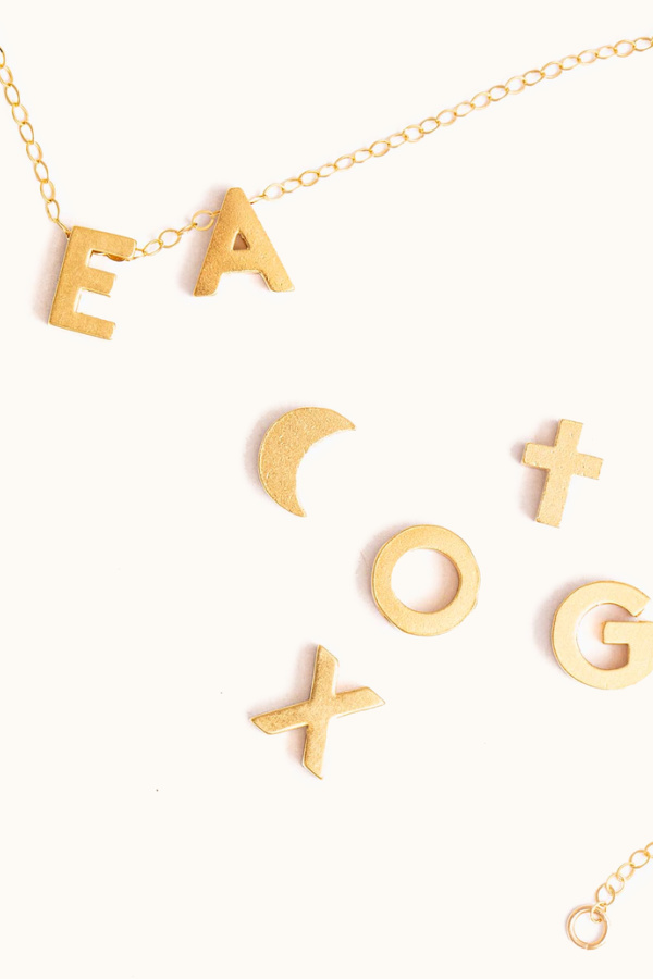 Add up to 6 charms on this personalized letter necklace from Able -- affordable and beautiful!