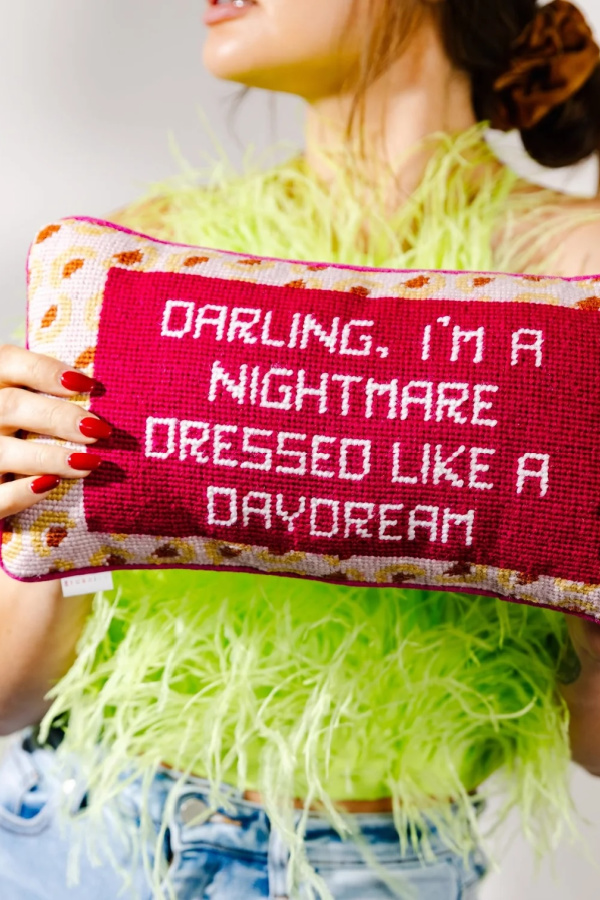 Beautifully made needlepoint pillows from Furbish Studio are one of the best gifts for a Taylor Swift fan.