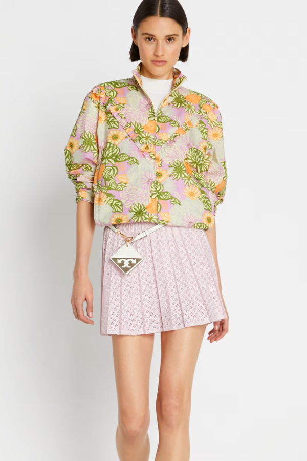Modern Preppy spring clothes on sale: Tory Burch eyelet-inspired laser-cut tennis skirt on sale in pink and white