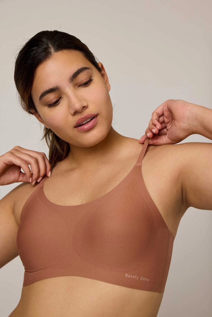 The NEWIWAI Barely Zero Spaghetti Strap Bra adapts to offer support through size fluctuations - and is a top pick for smooth, no-show support from the editors of ELLE (sponsor)